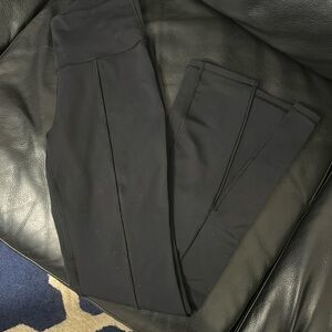 TnAction woman’s flare leggings with front slits on bottoms